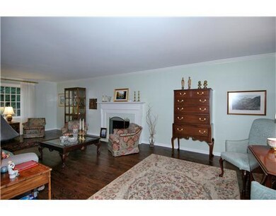Living Room. Hardwood flooring, fireplae, crown mo