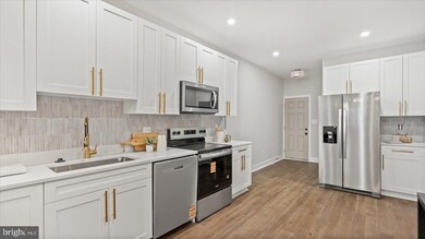 705 E 22nd St, Baltimore, MD 21218 - photo 6