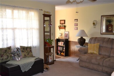 Living room with view of entrance.
