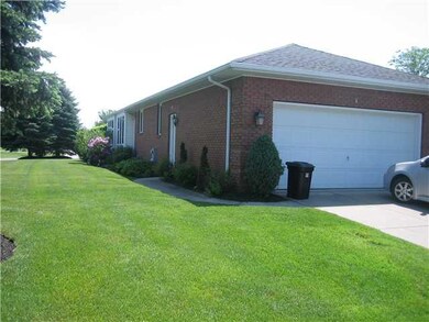 Exterior Front. Awning covered  terrace.  Large tw