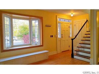 Foyer. Lovely front door with side lights welcomes