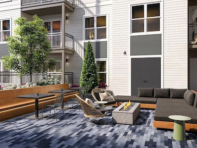 Building lobby featuring wood walls and a high ceiling