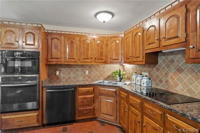 Kitchen Appliances include a Built-in GE Microwave