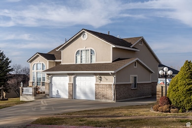 View of front of home featuring a garage