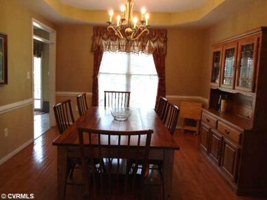 Dining Room - Oversized Dining Room with wood floo