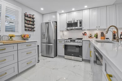 Tropic Bay unit 107, Delray Beach, FL 33483 - photo 2