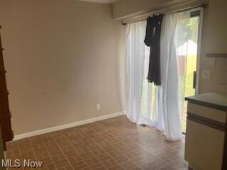Empty room featuring a wealth of natural light