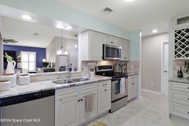 Pass thru to dining room, deep sink, win