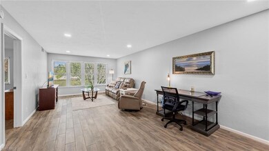 Office area with recessed lighting, wood finished 