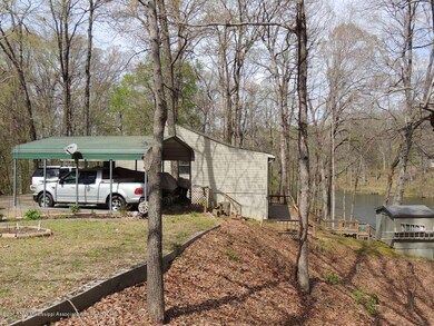 Free standing carport & one shed