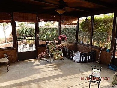Screened-in sun room w/wood roof and ceiling fan