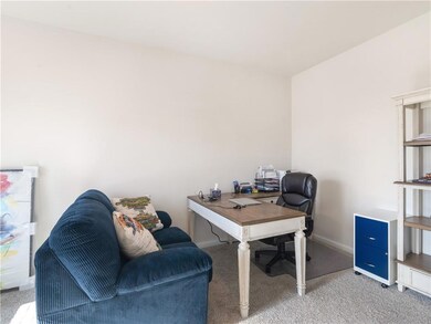 Home office featuring carpet flooring