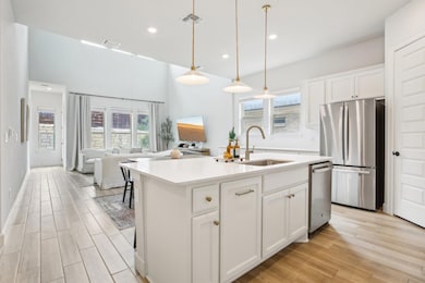 Kitchen featuring appliances with stainless steel
