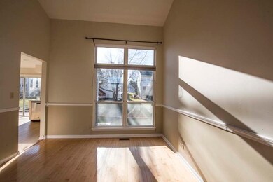 2 story ceiling, Large window. Hardwood flooring.