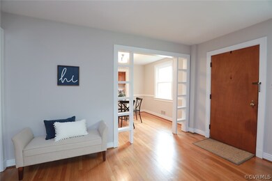 Entrance foyer featuring light hardwood / wood-sty