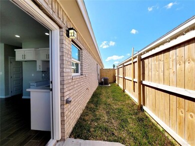 View of home's exterior with central AC
