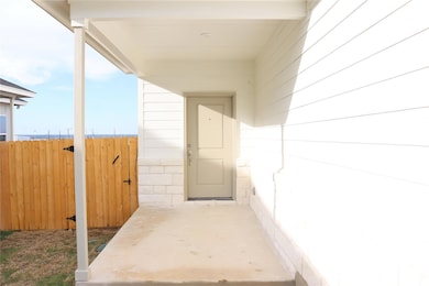 Entrance to property with a patio