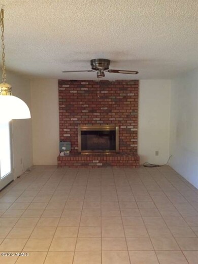 family room with wood burning fireplace