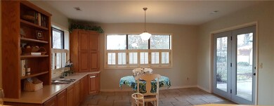 Kitchen casual Eating area with French doors to th