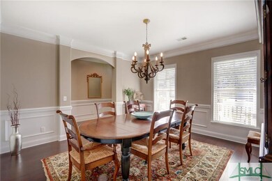 Arched opening and extensive molding trim in Forma