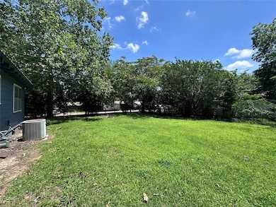 View of yard with central air condition unit