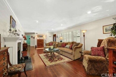 Another view of living room, notice the hardwood f