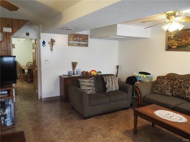 Front living room with tile floor.