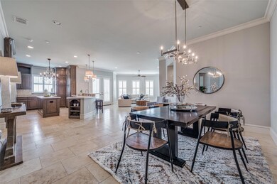 The dining room is open to the living room and kit