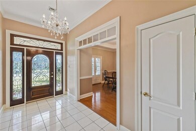 Impressive entryway with stunning front door!