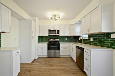 6805 N Askew Cir, Kansas City, MO 64119 - photo 7