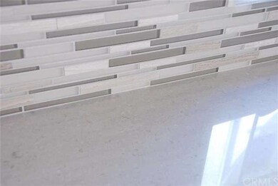 Caesarstone Quartz countertop makes Kitchen clean-