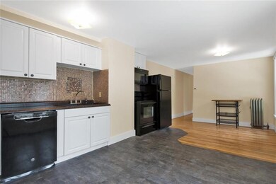 Kitchen and dining area to the right.