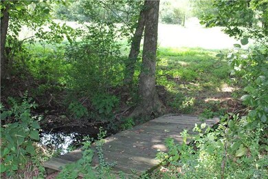 Creek runs to right of home