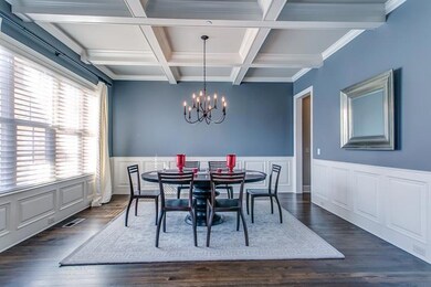 Formal Dining room with Coffered Ceiling.