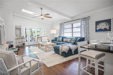 Family Room with Vaulted Ceiling, Skylights and Fr