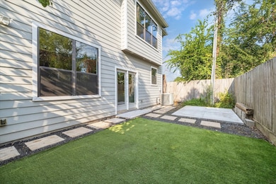 Lovely backyard offering ample room for outdoor dining, entertaining, and play. Direct access to the backyard from the living room.