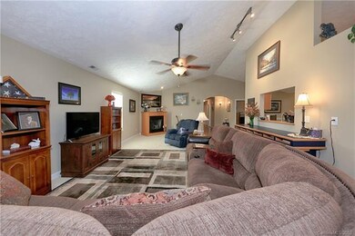 Enter into Huge  Living room with a vaulted ceilin