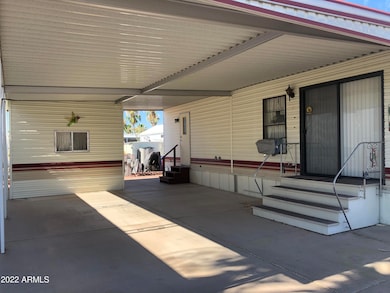LARGE CARPORT AREA