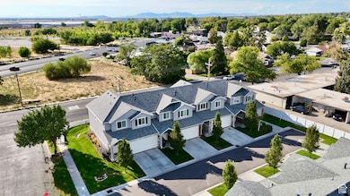 Aerial perspective of suburban area with a mountainous background