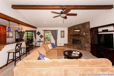 open plan with woodburning fireplace