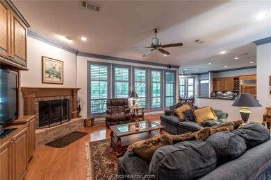 Living Room with converted gas log wood burning fireplace
