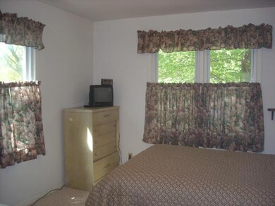 Private third bedroom off the dining area.