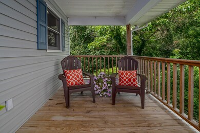 Front porch with chairs and flowers