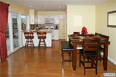 Combination Family Room and Dining Room with Wood 