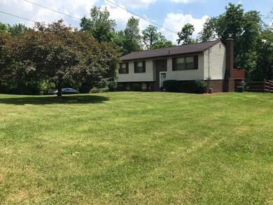 House sits quite nicely on the almost 1/2 acre lot