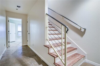 The bright entry is highlighted with stained concr