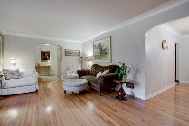 The living room has a gorgeous stone fireplace as 