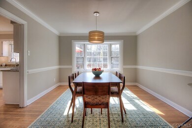 Simple yet elegant formal dining room with hardwoo