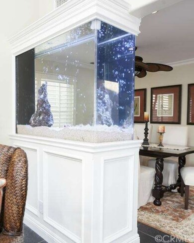 Custom 400 gallon aquarium is the perfect room div