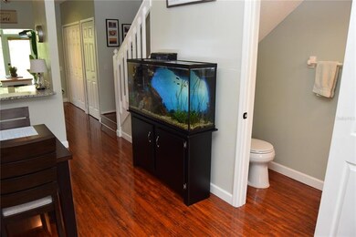 Looking towards the back of the townhome, you can see the Guest Bathroom (1/2 Bath) on the right.